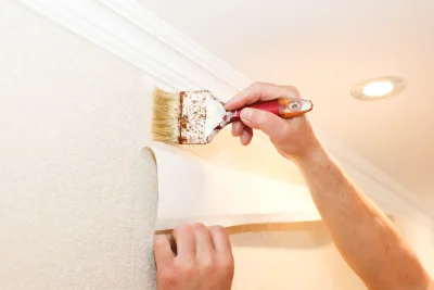 Pose de papier peint à Fauguernon — revêtements muraux et toiles de verre